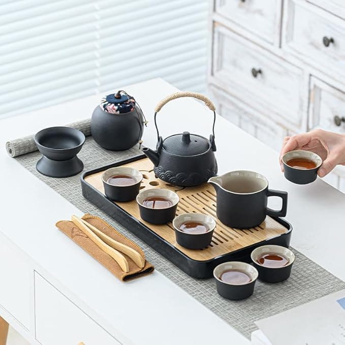 A set of high-quality tea cups and a tea pot